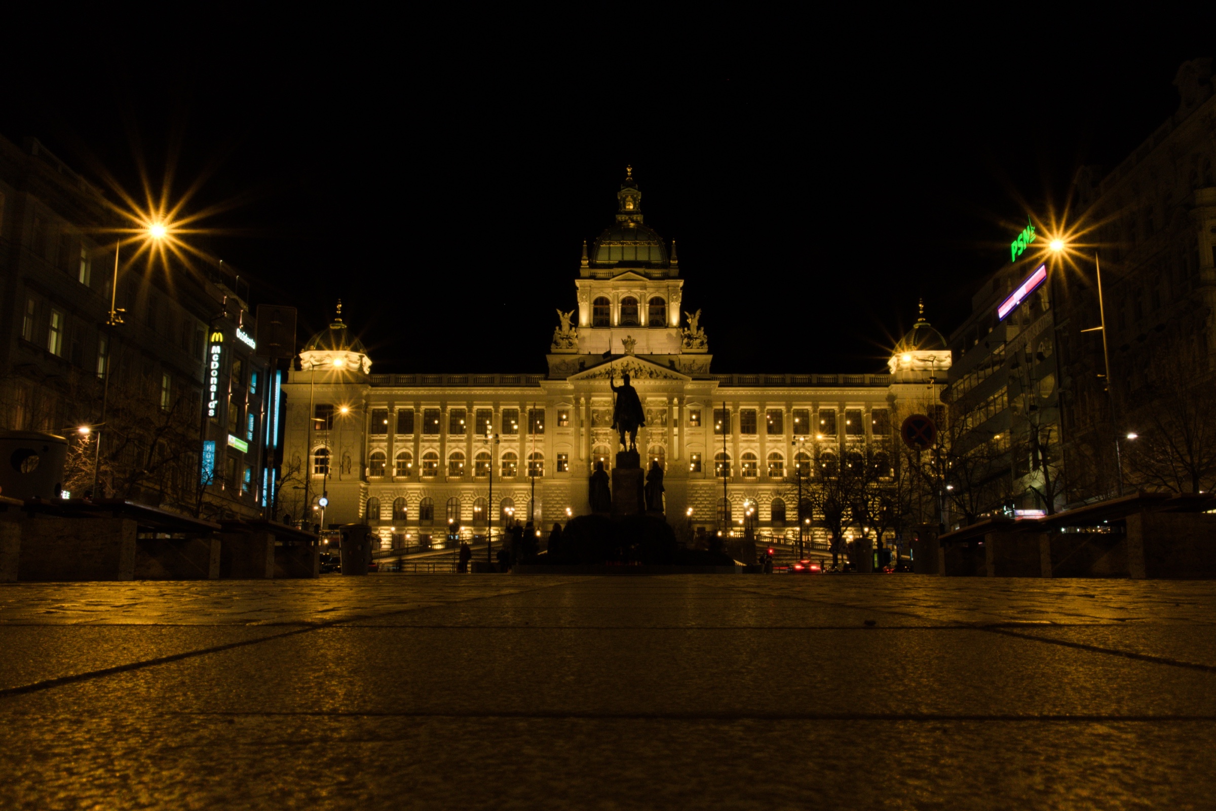 Historic city building illuminated at night